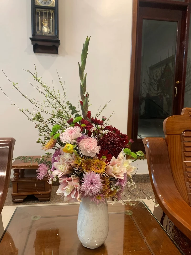 Chụp ảnh Tết ấn tượng cùng Ảnh bình hoa Tết chụp ảnh