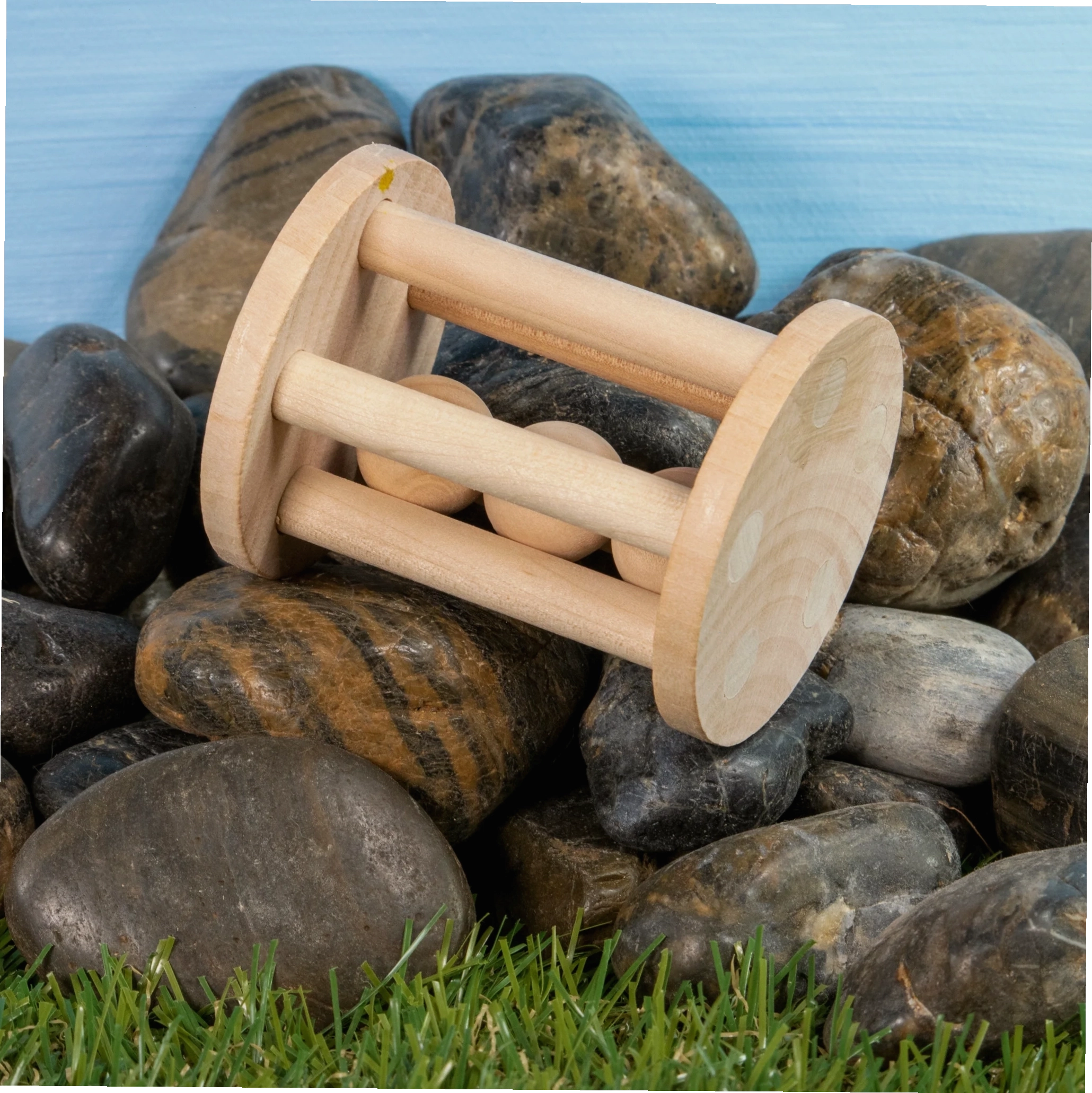 Various enrichment toys for pet rabbits placed in a play area